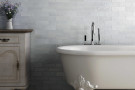  Ambiente revestimiento mallorca-65x200-blue-bathroom_mod-819x1024